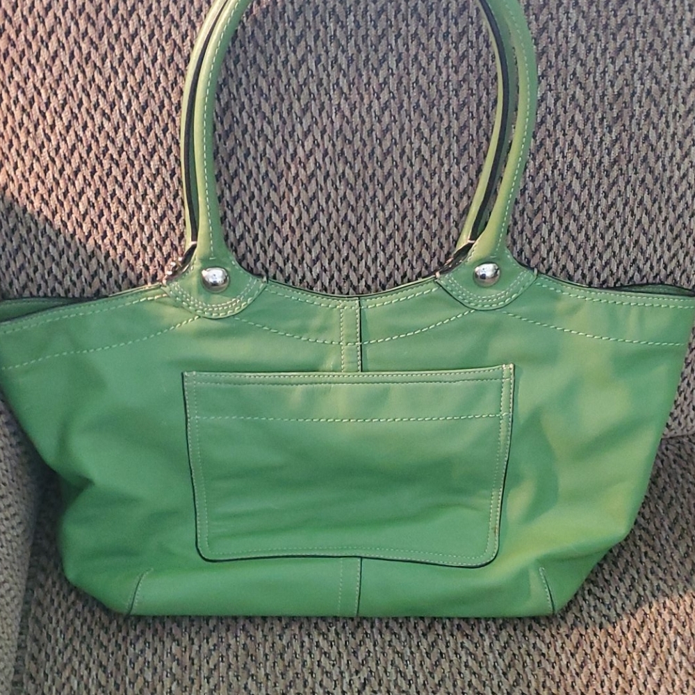 Green Coach handbag.